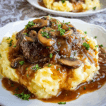 Salisbury Steak with Garlic Mashed Potatoes and Mushroom & Onion Gravy
